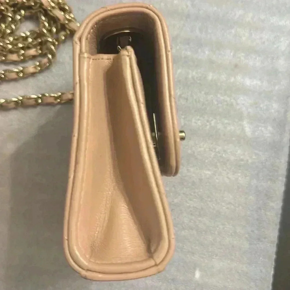 Chanel
Lambskin Quilted Mini Trendy CC Clutch With Chain - Picture 13 of 16